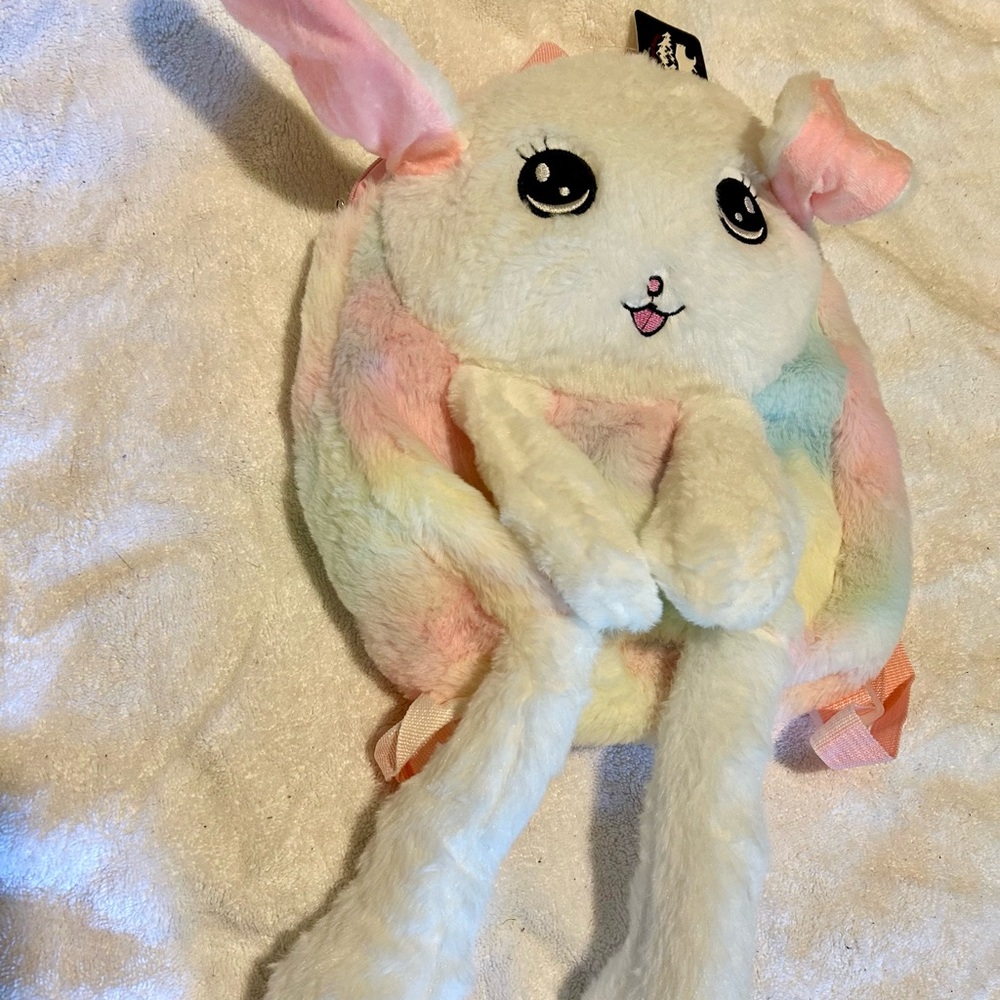 CPB Fluffy White and Pink Kids Backpack when they oust its feet the ears pop up
